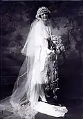 Short wedding dress with long train attached, 1920s