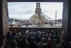 Buddhists praying on the occasion of Buddha Jayanti (during a renovation of a Boudhanath temple)