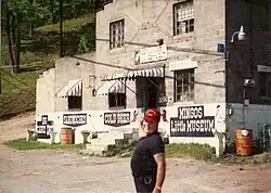 Charles Blevins standing in front of the Red Robin Inn
