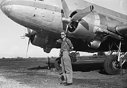 Cees Taillie posing in front of a Dakota on Mandai Airfield (1949)