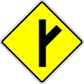 Skewed side road junction on the right