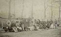 Actors and soldiers with a mock-up train, 1899[5]