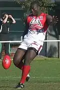 Canada's ruckman Manny Matata takes a kick against Sweden in round 2