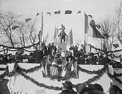 Photograph of people gathered for the statue dedication ceremony