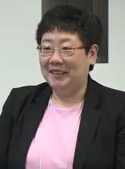 Eng in pink and black clothing