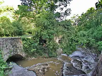Chautard river with an ancient watermill, in Tourrettes