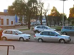 Chevy C2 Swing and Sedán next to each other