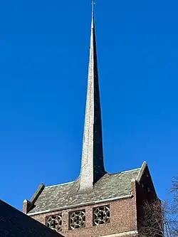 Church belfry steeple with needle-like spire