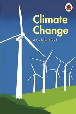The front cover of the book. It shows a stylized drawing of modern windmills on mainly blue background to represent the sky. The lower part has a green background to represent fields