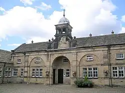 Former coach house or stable block*