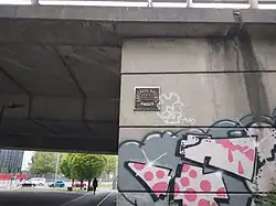 Concrete Society 1968 Award on the side of the Mancunian Way elevated motorway, Manchester, England