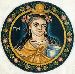 Coptic tapestry medallion showing Gaea wearing a mantle knotted on her breast. From Akhmim, 3rd or 4th century. Hermitage Museum
