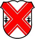 Argent, a saltire cottised gules, between two ermine spots in fess
