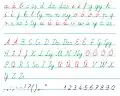 Handwritten cursive alphabet with all lowercase letters followed by capitals and punctuation, with consonants in green and vowels in red