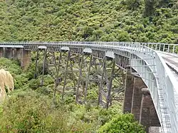 photo of steel trussed curving railway bridge