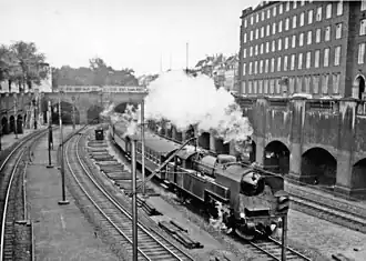 A DSB train passing Vesterport Station on the main line tracks in 1960
