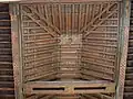 The wooden ceiling (with some painted and carved ornamentation) of the southern chamber