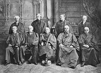 Group photograph of the nine justices, seated