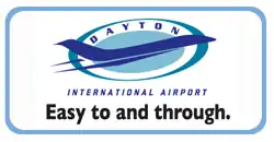 Logo for Dayton International Airport containing airport name, aircraft silhouette, and the slogan "Easy to and through."