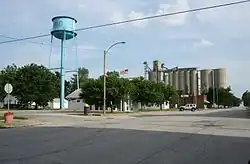 Water tower, Post Office, Goose Creek Library and grain elevators in downtown De Land, 2007