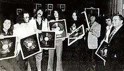 A monochrome photograph of the band Deep Purple with John Coletta, Marcel Avram and Wilfried Jung