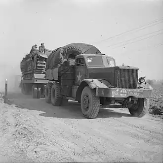 Diamond T tank transporter with a Churchill tank during preparations for crossing the Rhine