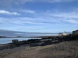 'Diving Rock', on the left of the image, often used to jump into the sea at high tide