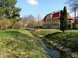 The brook Radotínský potok in Drahelčice