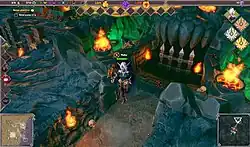 Thalya stands in front of a dungeon entrance