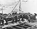 This 1904 photograph pictures the official laying of the cornerstone in Dunoon, Scotland, of the Dunoon Pavilion, which was designed by Scottish architect William Fraser, ARIBA, who is pictured first on the left wearing a top hat. Private Collection.