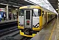 A E257-500 series EMU on a Shinjuku Sazanami service in May 2010 at Akihabara Station