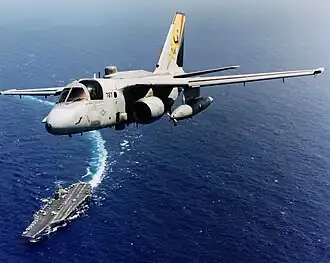 The C.A.G. bird of VQ-5 as part of CVW-14 over the Abraham Lincoln in 1998.