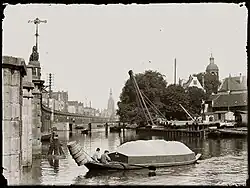 The viaduct between Westerdok and Korte Prinsengracht (1899). Right: Bickersplein, turret of the Eilandskerk.