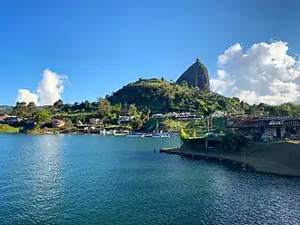 View of El Peñón de Guatapé from highway bridge