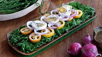 Ensaladang pako (fern salad) with salted egg from the Philippines