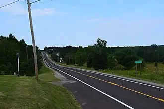 Sign for Nisula on westbound M-38