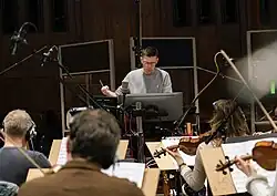 Erik Arvinder conducting an ensemble