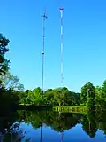 Estabrook Park pond with antenna towers across the river in the background