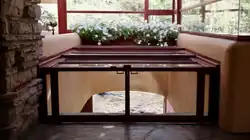 The hatch in the living room, which leads to a staircase to Bear Run