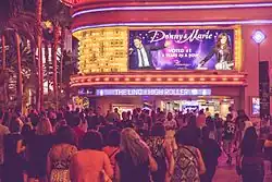 A digital marquee, displaying pictures of Donny and Marie Osmond with the text "Donny & Marie, voted #1 3 years in a row".