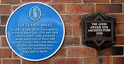 Civic Trust plaque and Leeds Award for Architecture on Fletland Mills