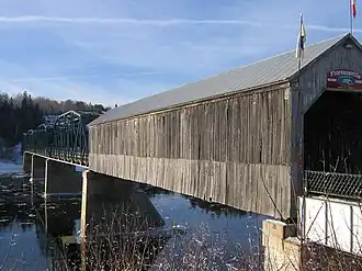 The Florenceville Bridge across the Saint John River is partly covered.