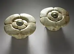 Flower-shaped jadeite earflares, Late Classic (Los Angeles County Museum of Art)