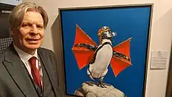 Artist with painting