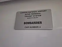 Bombardier's nameplate inside a Gatwick Airport shuttle car