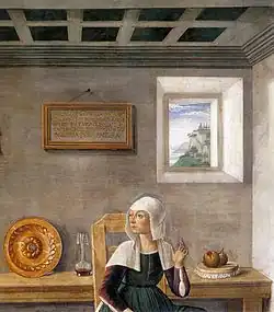A detail of one painting shows the surprised face of one nurse, an open window and a framed plaque.