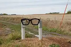 Signpost near the Clear Lake crash site where Buddy Holly died.