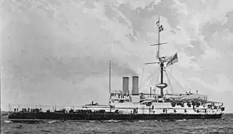 Ironclad warship with large forward turret and white superstructure