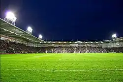 a floodlit rugby league stadium