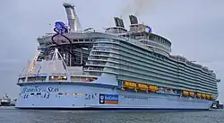 The aft of Harmony of the Seas, with the Aqua Theater and "Ultimate Abyss" slides visible